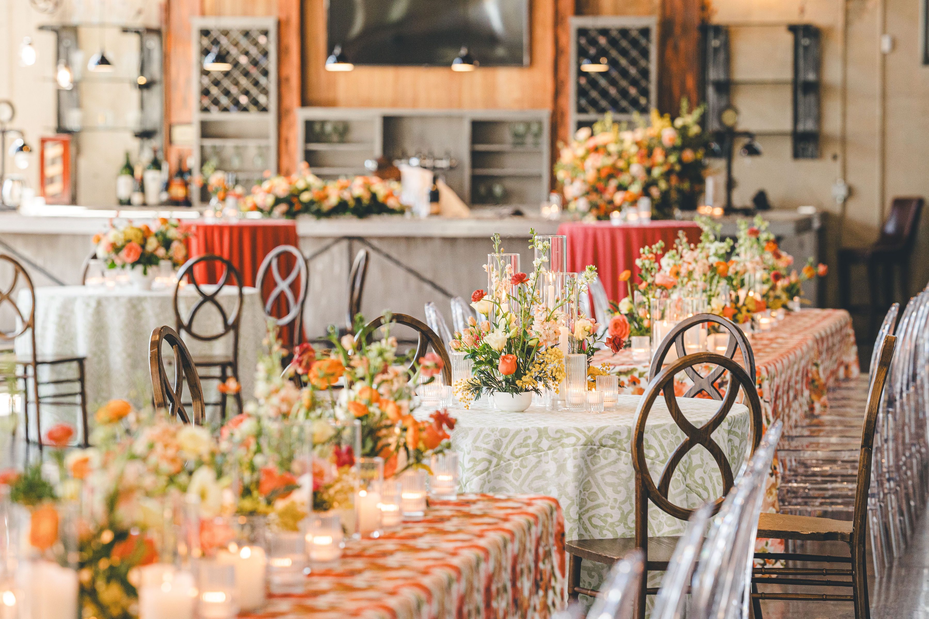 colorful orange and white wedding reception decor