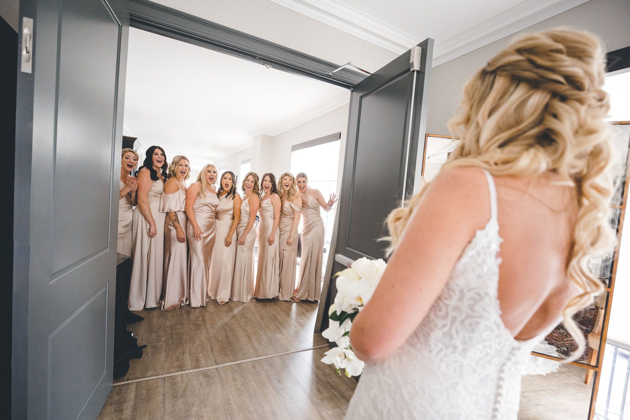 bridesmaids first look at bride