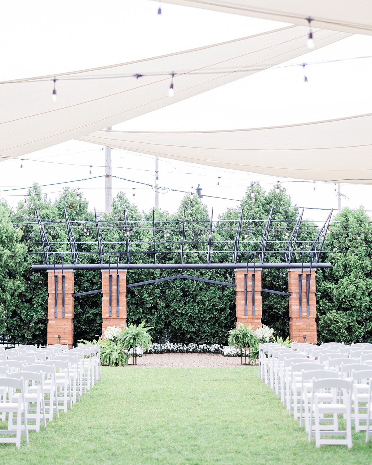 courtyard wedding with sun shades