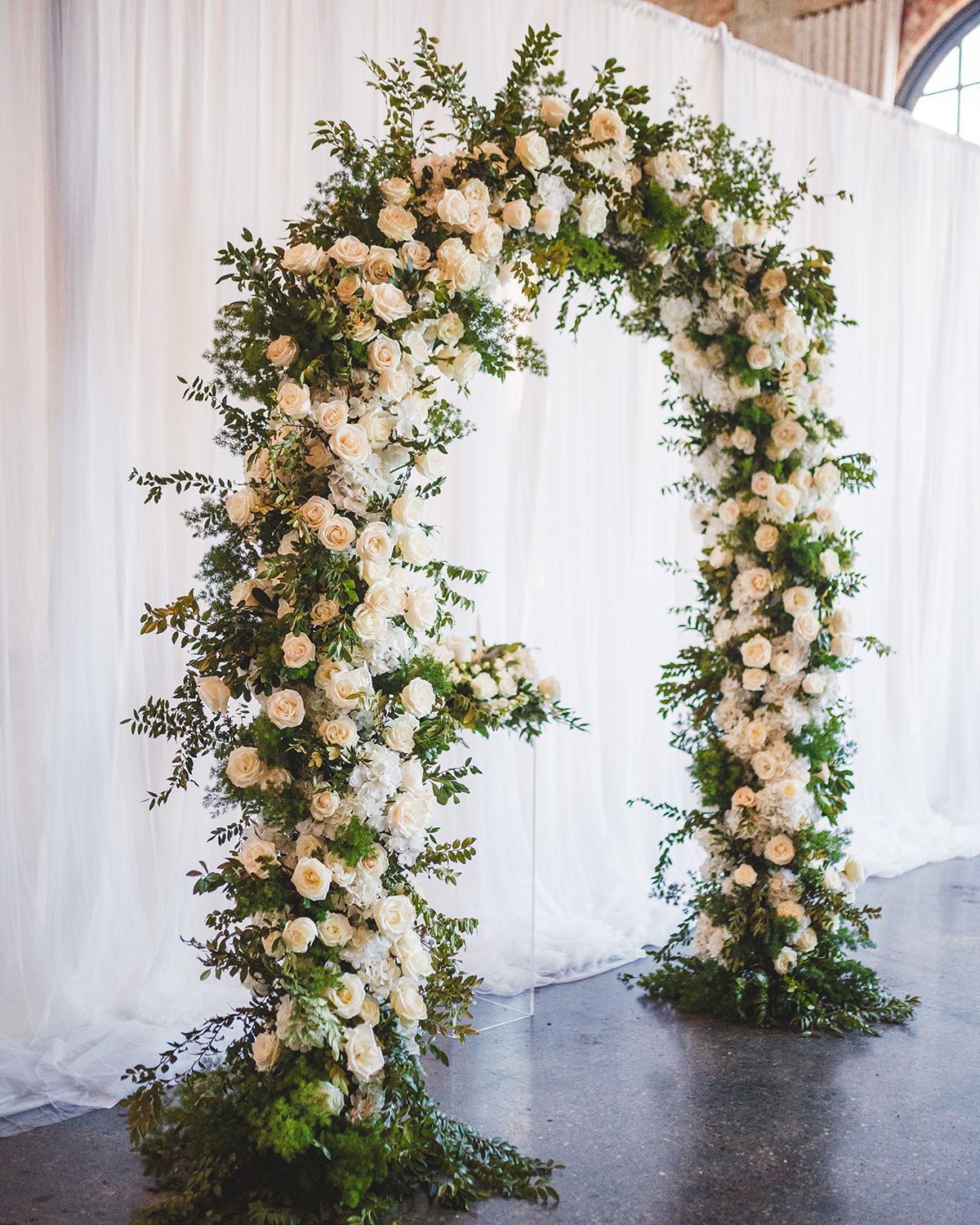 white rose wedding arch