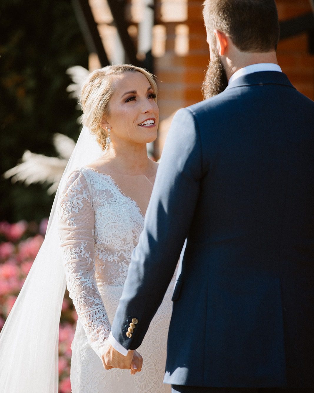 bride looking at groom