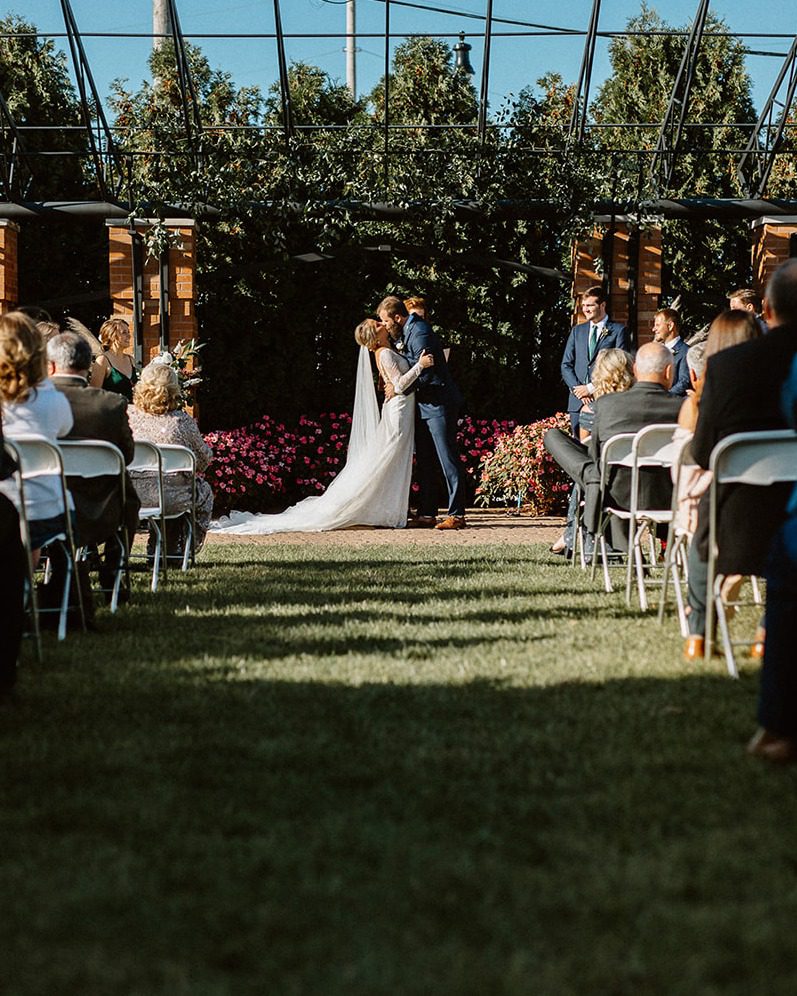 bride and groom's first kiss