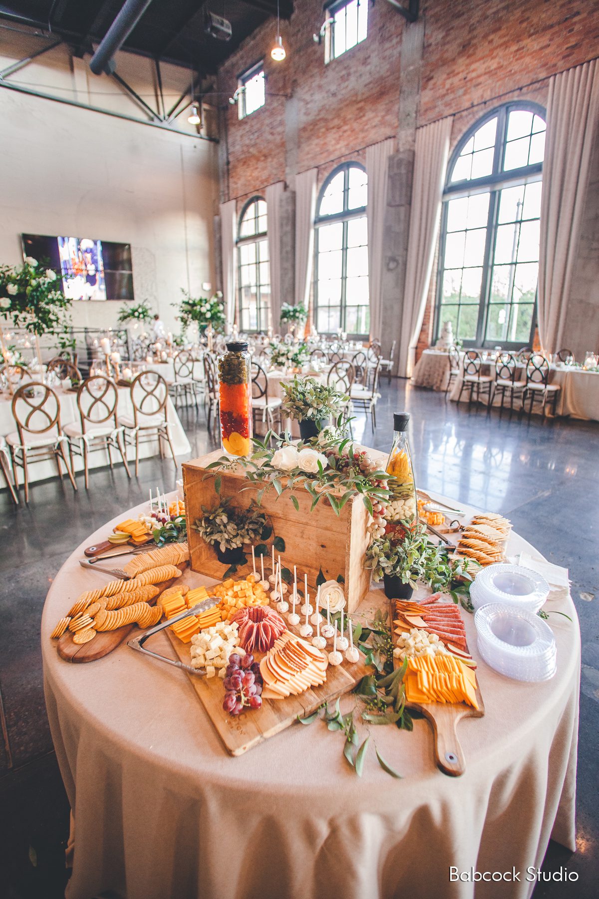 table with charcuterie board and snacks