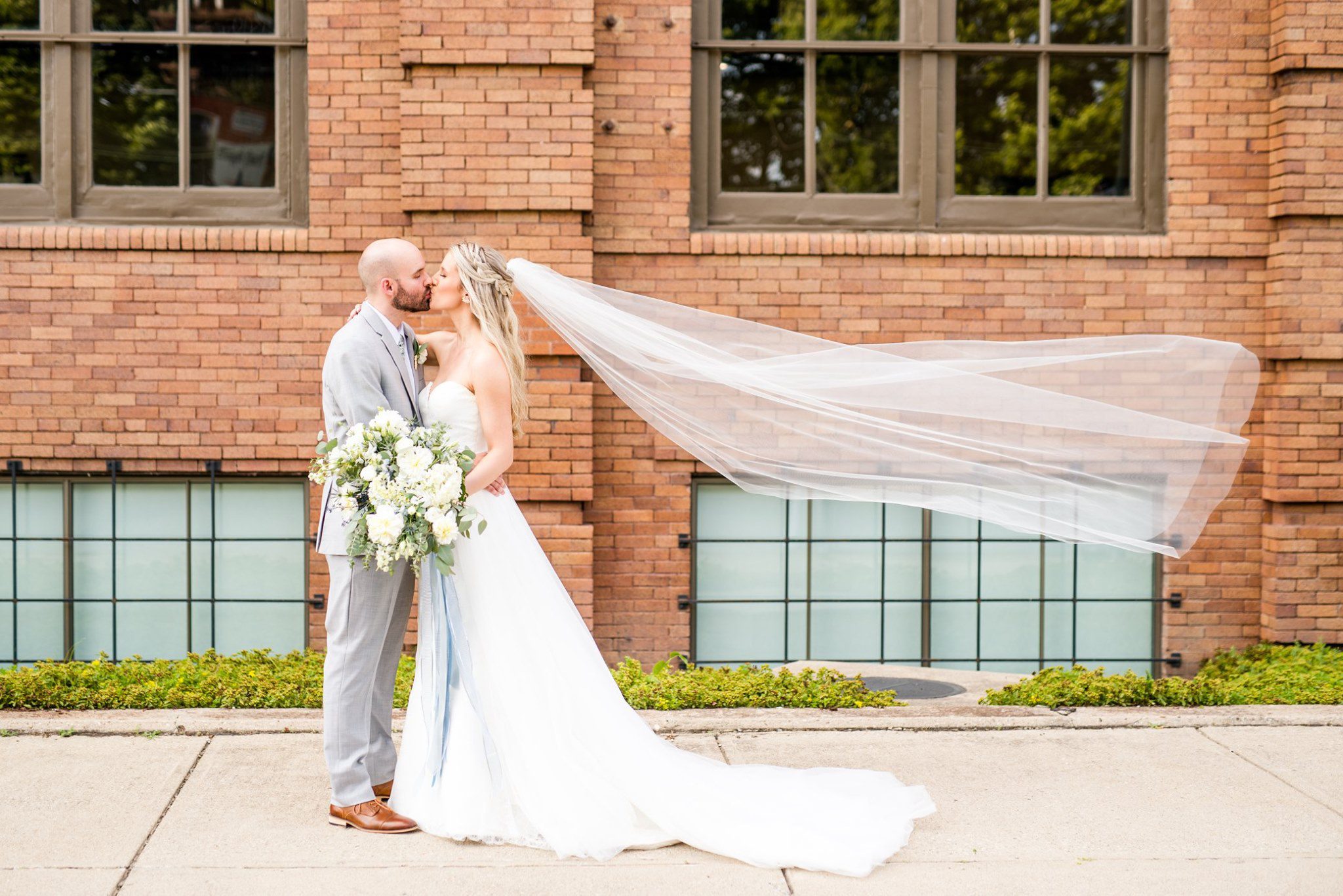 bride and groom kissing